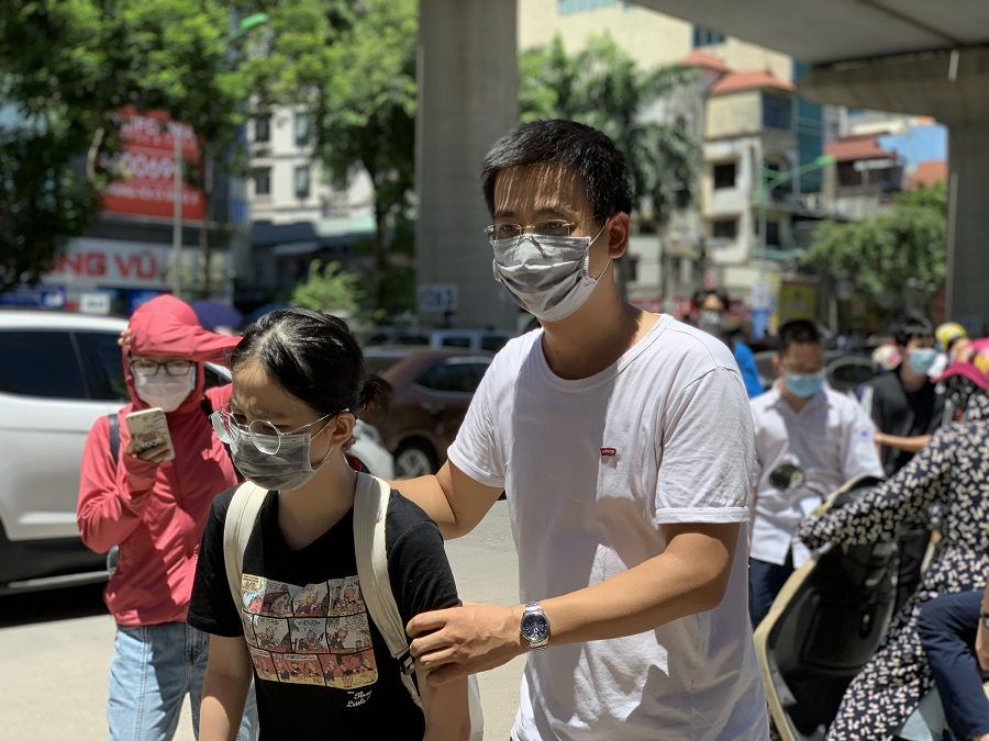 A picture containing person, outdoor, crowdDescription automatically generated